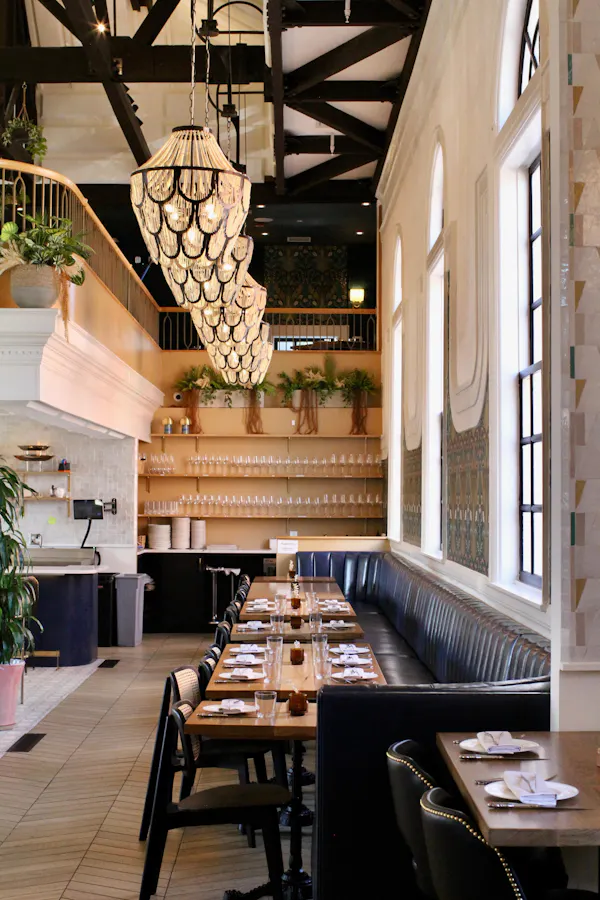 ceiling, chandelier, light fixture, restaurant, chair, cafeteria