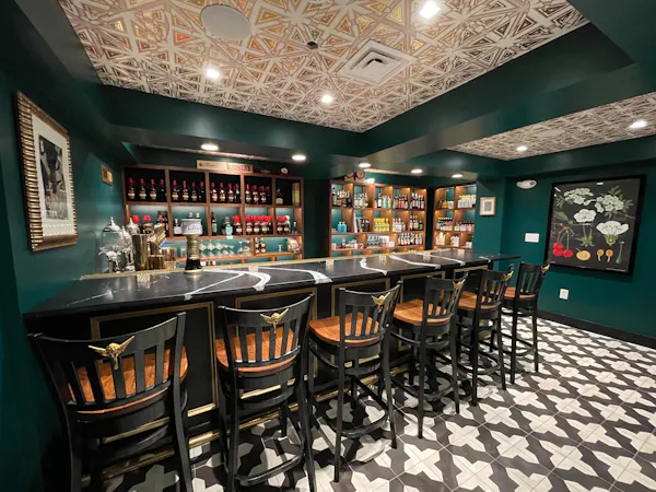 table, property, chair, picture frame, lighting, barware