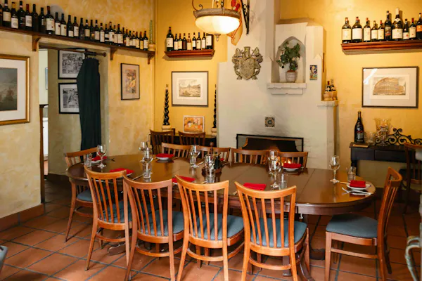 furniture, table, chair, dining room, drinkware, picture frame