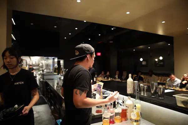 t-shirt, barware, drinkware, cap, alcoholic drink, bar