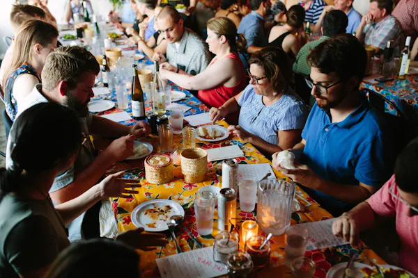 food, table, tableware, sharing, chair, wine glass
