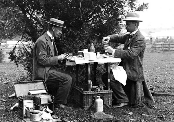 clothing, hat, furniture, table, trousers, human body