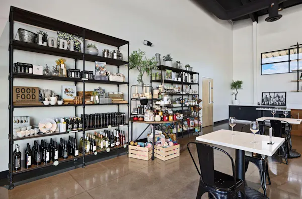 table, furniture, shelf, shelving, eyewear, bottle