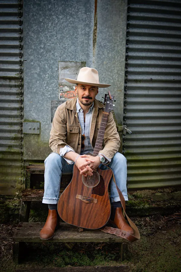 hat, chordophone, facial hair, headgear, cowboy hat, sun hat
