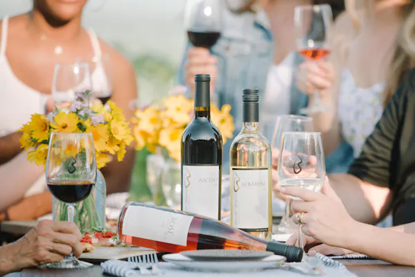 clothing, bottle, tableware, table, flower, drinkware