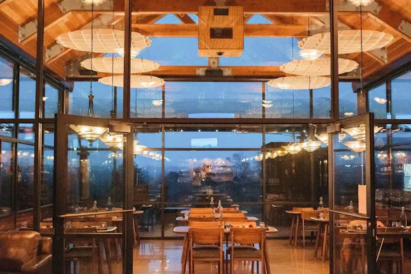 ceiling, lighting, restaurant, light fixture, glass, chair