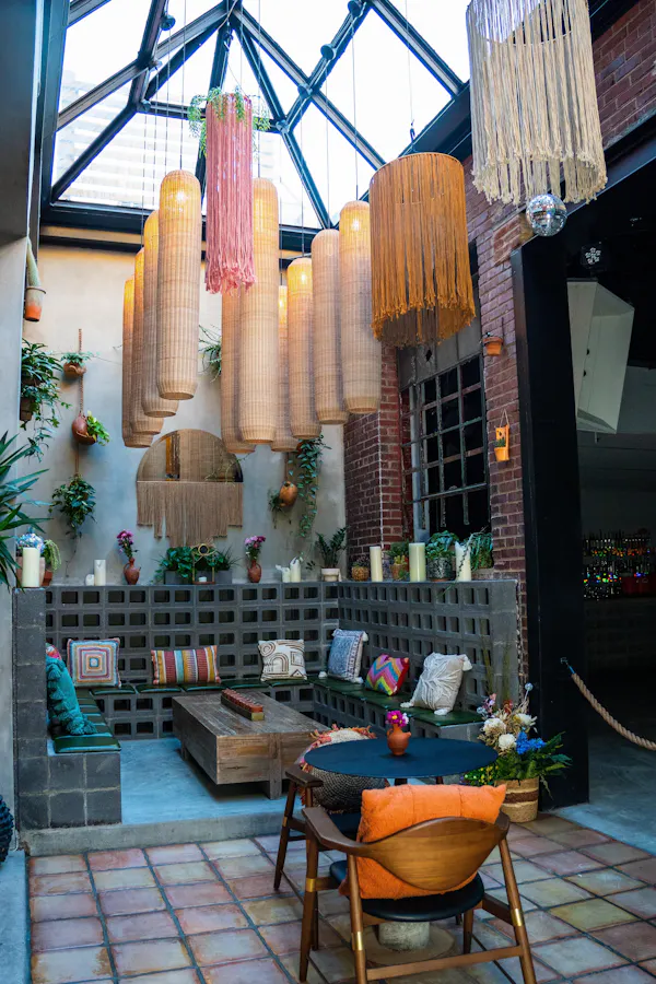 light fixture, flowerpot, chair, restaurant, houseplant, decoration