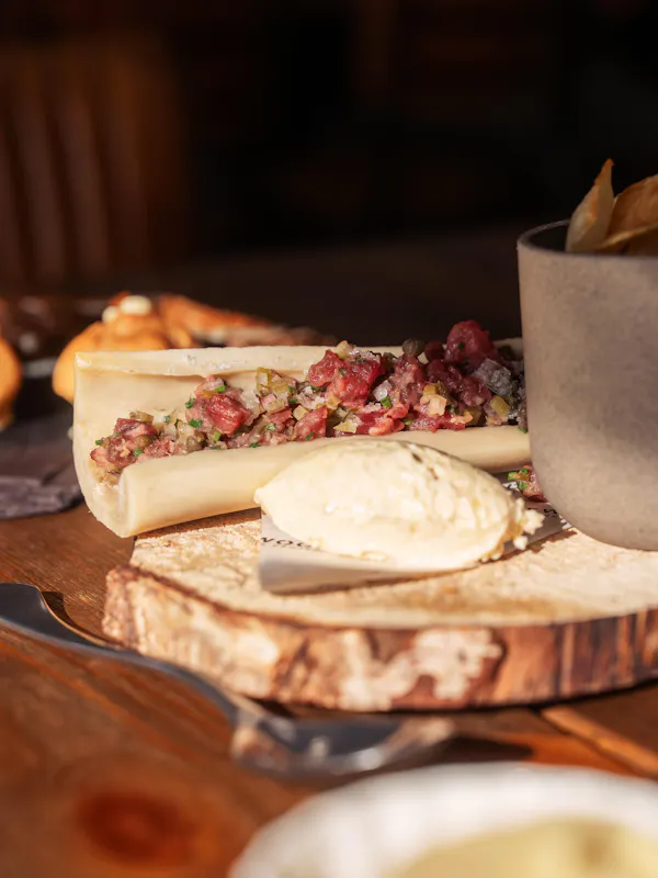 food, ingredient, tableware, cheese, cutting board, dairy product