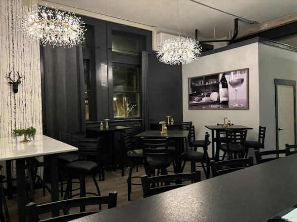 table, furniture, chair, lighting, picture frame, couch