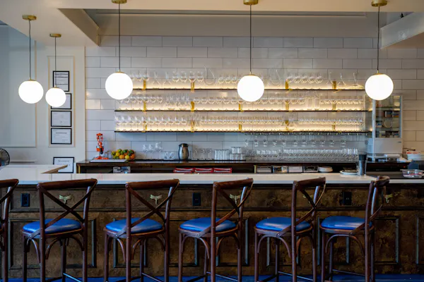 furniture, light fixture, lighting, ceiling, restaurant, bar stool