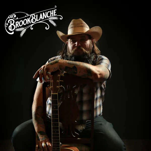 tattoo, hat, chordophone, musician, facial hair, musical instrument