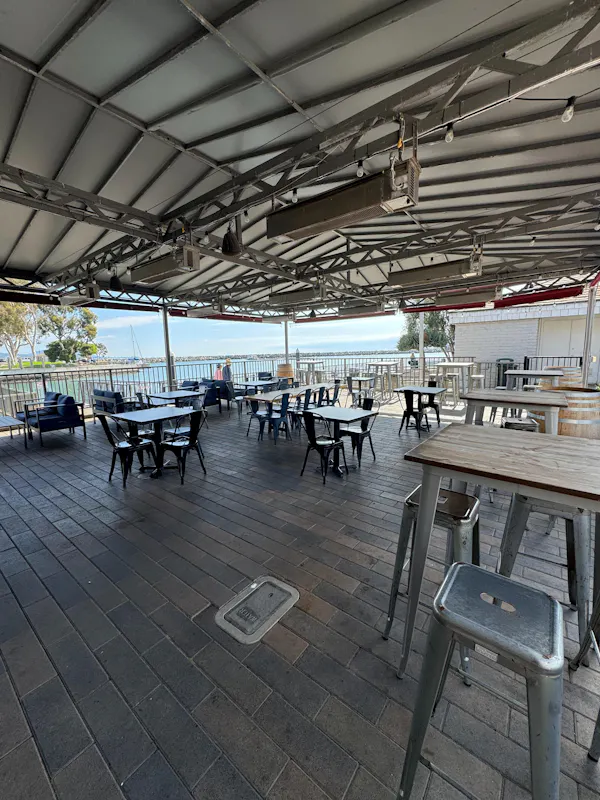furniture, chair, outdoor table, restaurant, outdoor furniture, shade