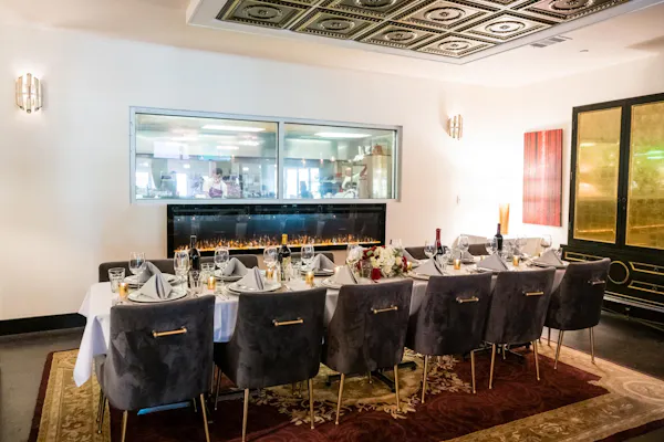 furniture, table, picture frame, building, chair, tablecloth