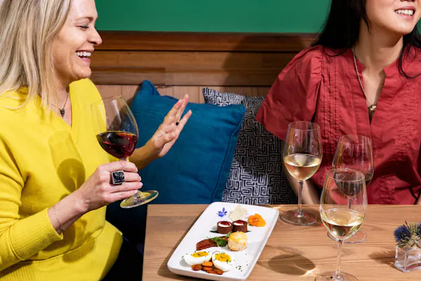 clothing, tableware, smile, table, stemware, food
