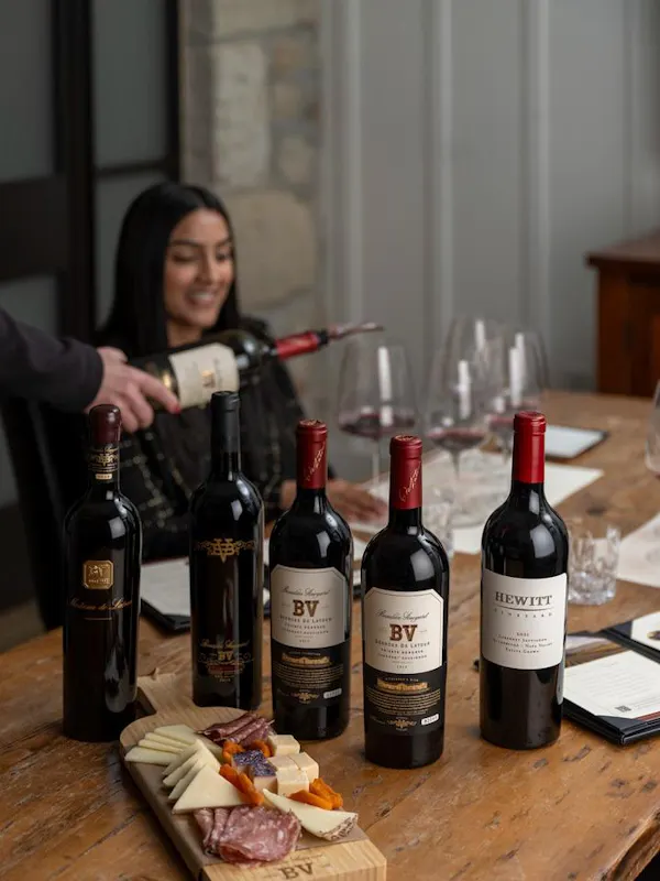 bottle, drinkware, table, wine, glass bottle, smile