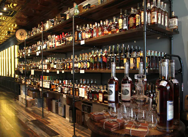 drinking establishment, bottle, drinkware, shelf, barware, glass bottle