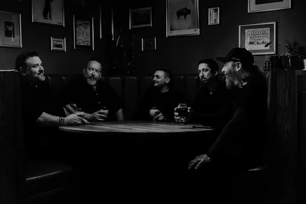 beard, facial hair, furniture, drinkware, monochrome photography, monochrome