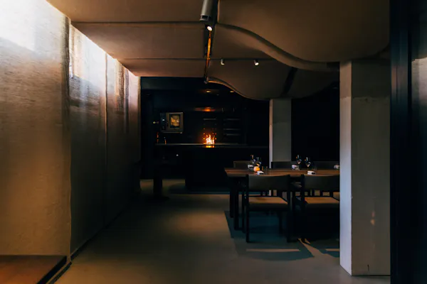 furniture, lighting, ceiling, light fixture, darkness, chair