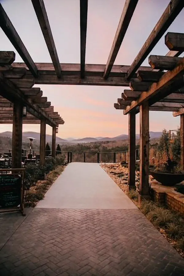 column, pergola, outdoor structure, pavilion, walkway, evening