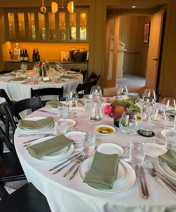 furniture, table, tablecloth, tableware, stemware, chair