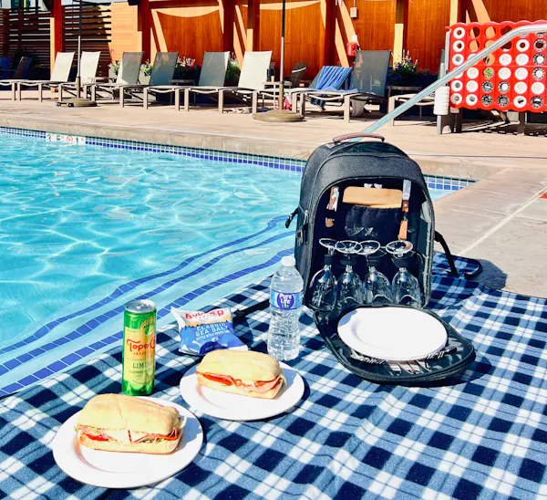 furniture, chair, bag, sunglasses, outdoor furniture, goggles