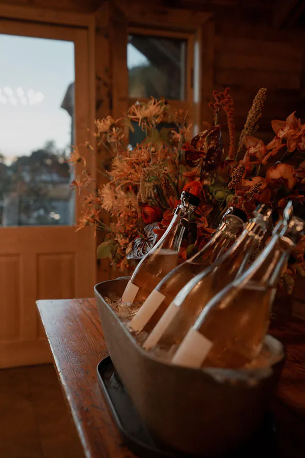 drinkware, glass bottle, bottle, glass, wood stain, flower arranging