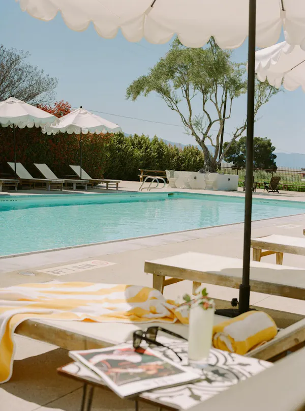 swimming pool, outdoor furniture, umbrella, furniture, resort, sunlounger