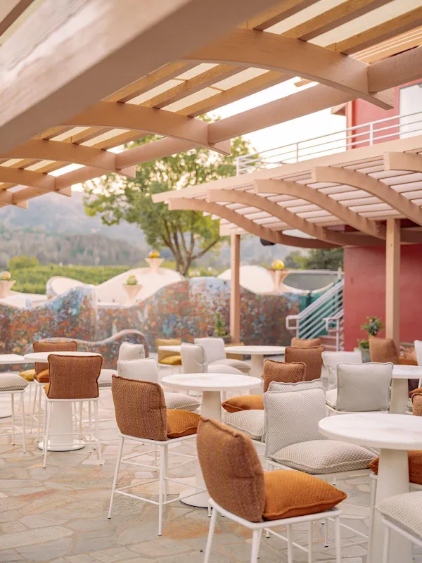 furniture, outdoor furniture, chair, outdoor table, restaurant, umbrella