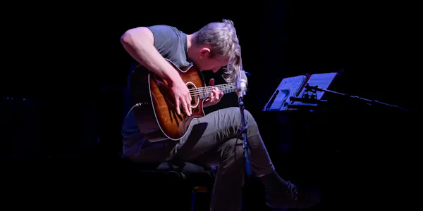 musical instrument, clothing, string instrument, plucked string instrument, chordophone, guitarist