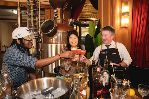 clothing, head, hand, barware, alcohol, bar