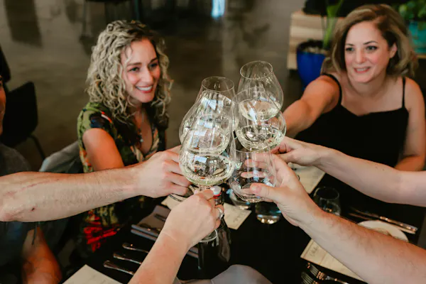 smile, automotive design, dress, stemware, social group, chair