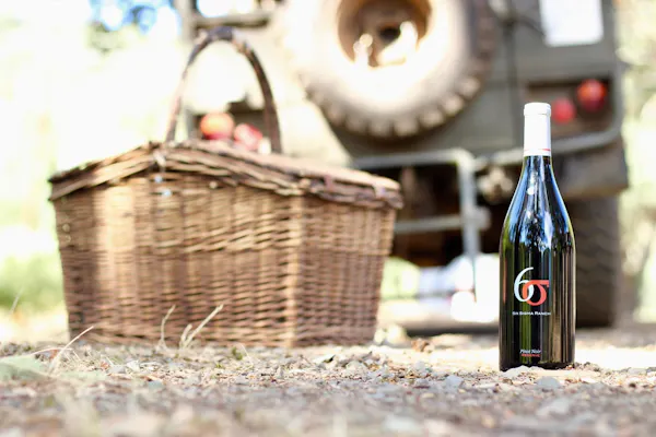 bottle, wood, drinkware, hat, storage basket, glass bottle