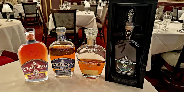 alcoholic drink, glass, logo, liquor, barware, bottle