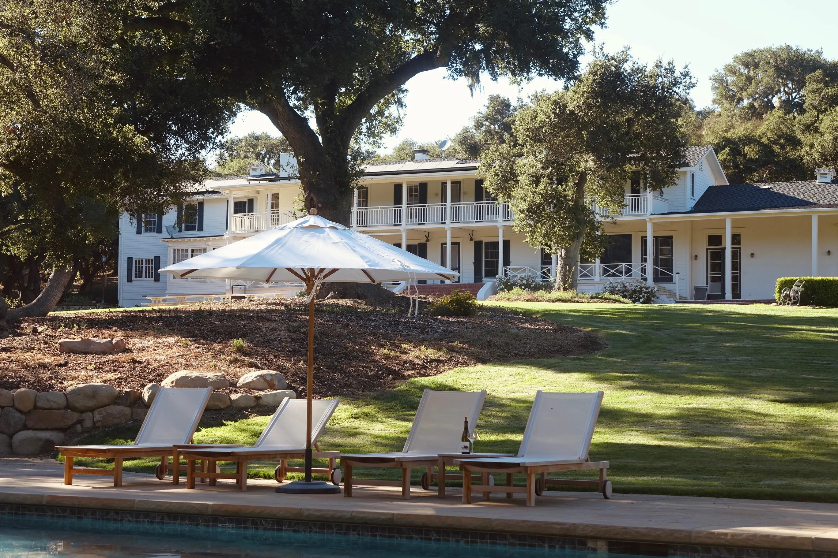 resort, shade, swimming pool, outdoor furniture, estate, lawn