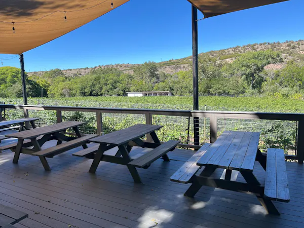 furniture, outdoor table, picnic table, outdoor furniture, shade, restaurant
