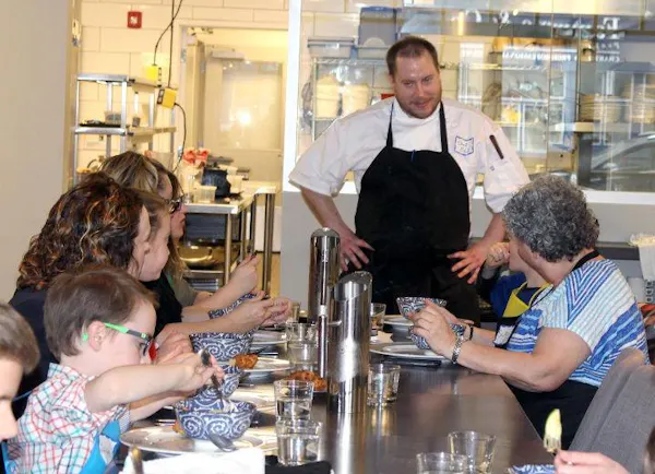shirt, tableware, table, apron, t-shirt, cooking