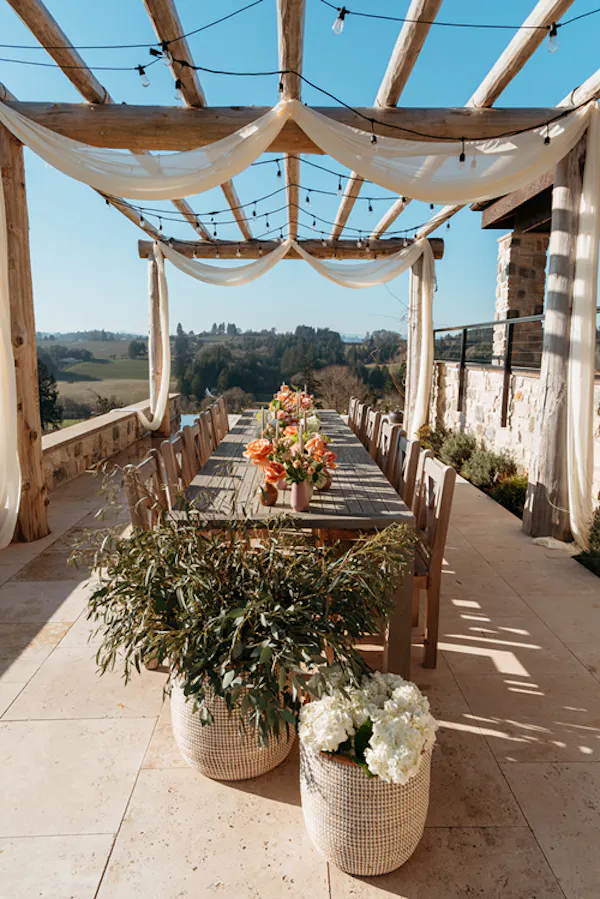 outdoor furniture, chair, shade, flower arranging, outdoor table, outdoor structure