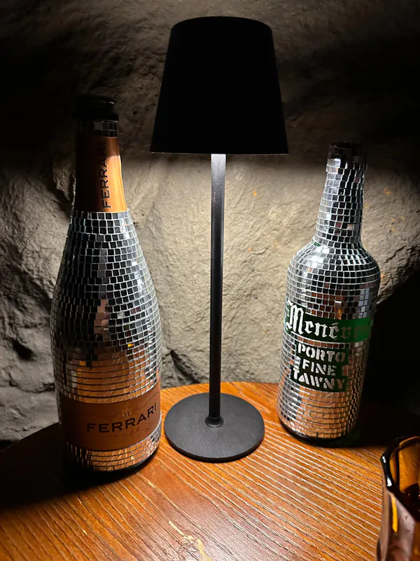 bottle, lampshade, glass bottle, barware, light fixture, alcohol