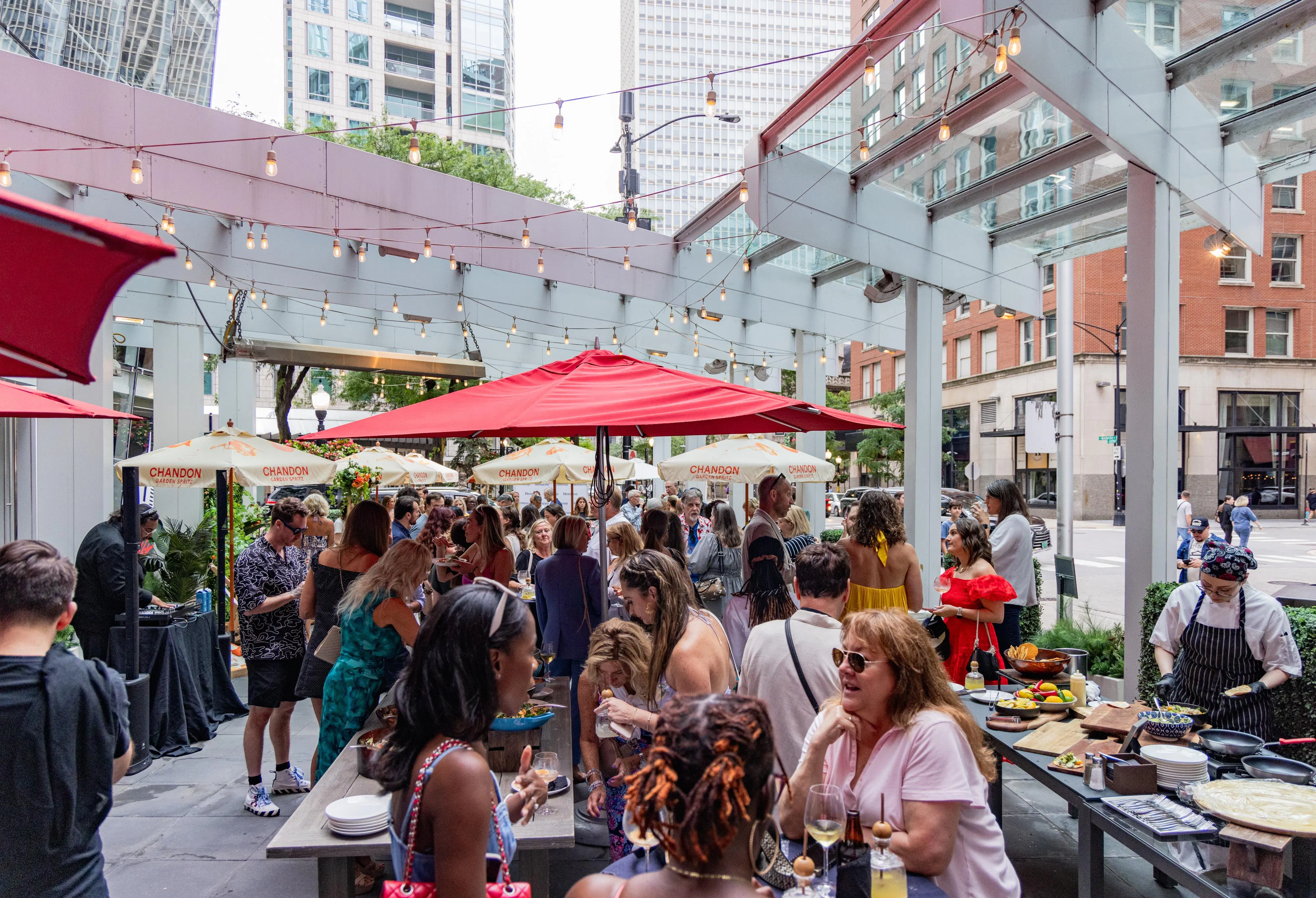 Image of Fête de la Musique showing crowd, public space, pedestrian, umbrella, leisure, and party