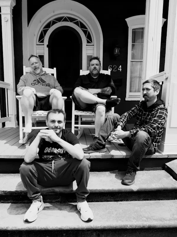shoe, leg, trousers, sitting, smile, beard