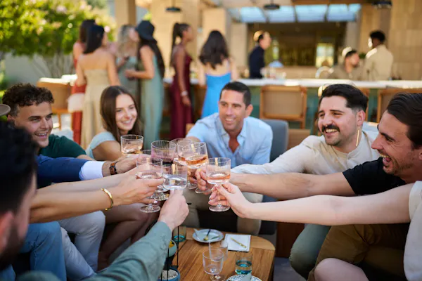 people, tableware, arm, drinkware, shirt, alcoholic drink