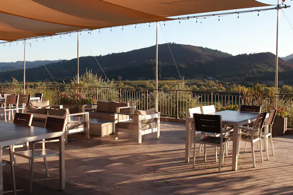 furniture, chair, table, outdoor furniture, shade, restaurant