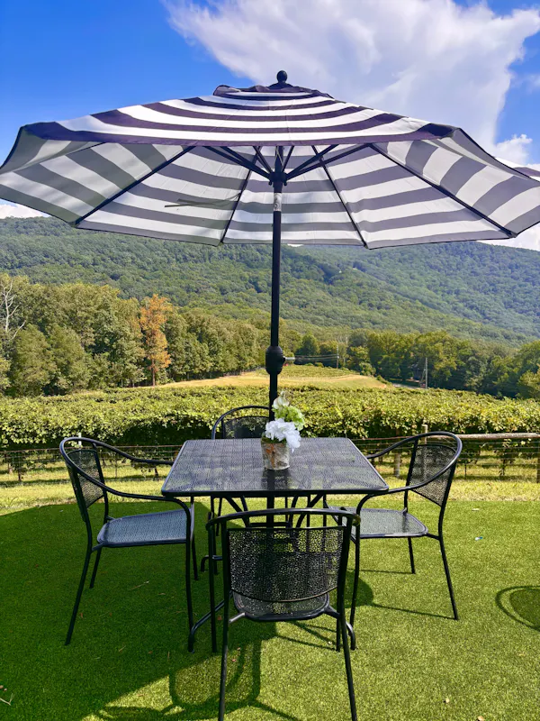 furniture, outdoor furniture, outdoor table, chair, shade, umbrella