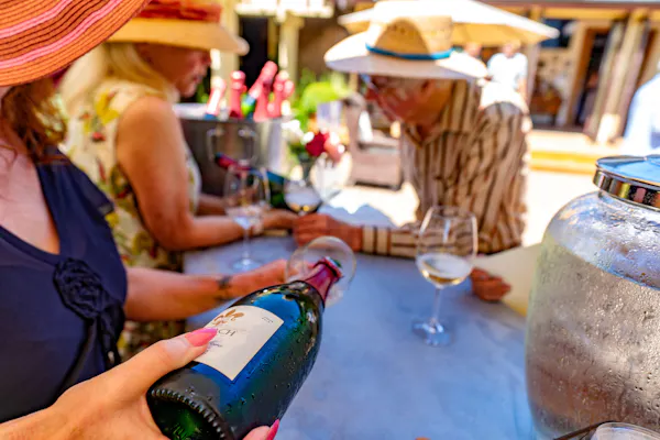 hat, headgear, sun hat, alcoholic drink, drinkware, cowboy hat
