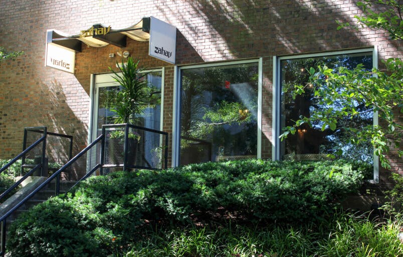Zahav • Philadelphia, PA - front entrance to restaurant with beautiful green foliage