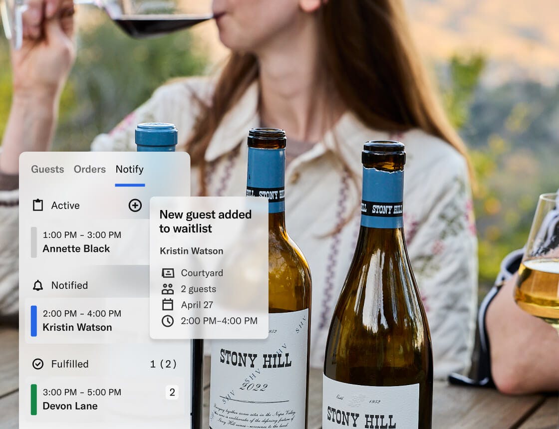 winery tasting outdoors with guests enjoying wine with a dashboard UI overlay