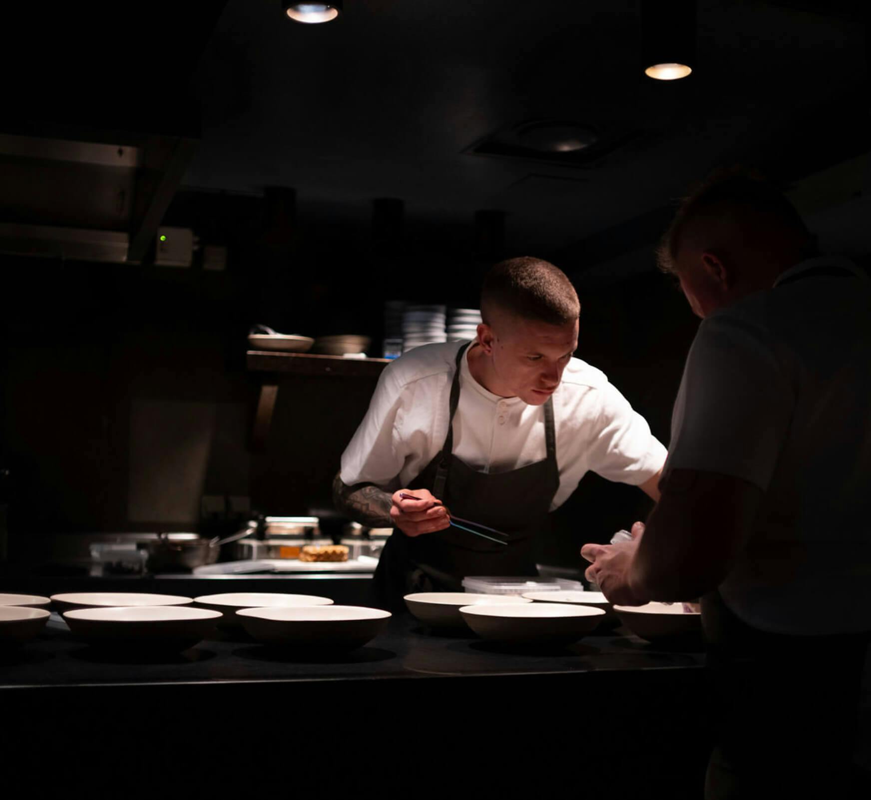 Chef plating food