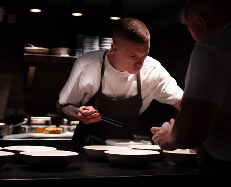 Chef plating food