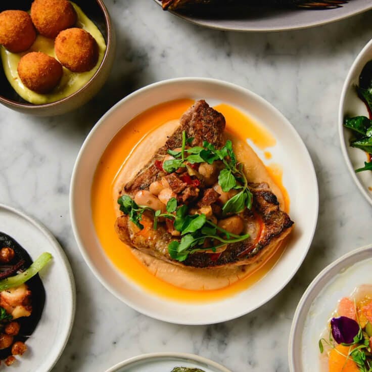 Celestine -  beautifully plated dish with orange glaze