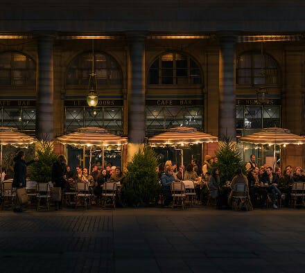 Intimate outdoor patio space at night